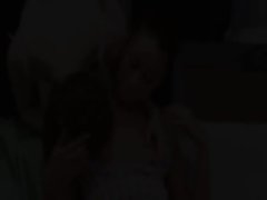 Two spanish gals play with strong man