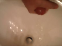 Cumming in the bathroom sink