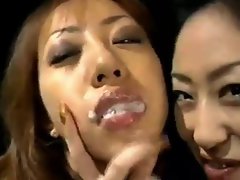 Attractive seductive japanese slutty chicks kissing.sharing cum and swapping cum