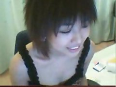 Luscious Asian girlie with lewd knockers on webcam