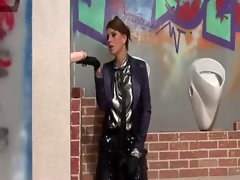 Glamorous lady playing with a bukkake toy at a gloryhole