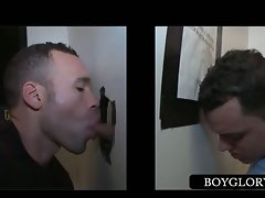 Tempting lad gets gay prick stroked on gloryhole
