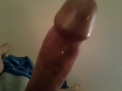 Pre cum flowing down long hard prick