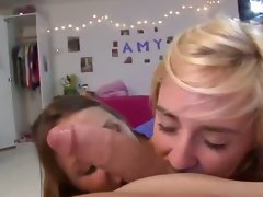 Two sensual college ladies stroking phallus