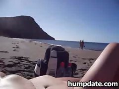Fellow gets handjob with satisfaction on the beach