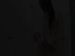 Dark haired chick pleasuring booth