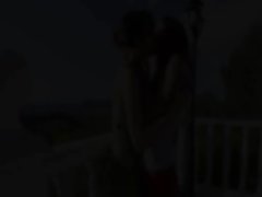 Two lesbos vibrating cunts outdoors