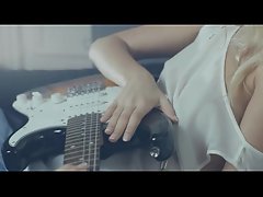 Fabulous light-haired and her guitar