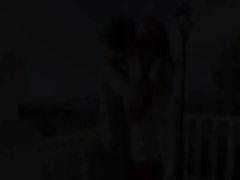 Two lesbos toying cunts outdoors