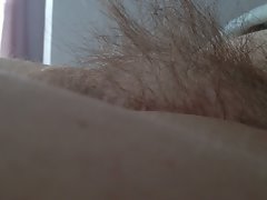 side view of the wifes tall long bushy twat