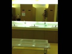 Exhibition wank in public gym