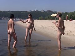 Nudist beach brings the best out of three filthy luscious teens