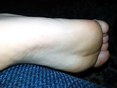 Cumming on her feet when she is in bed :)