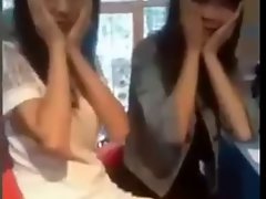 Chinese girl's skirt flipped by her friend