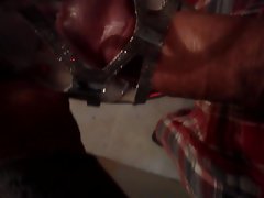 grinding her silver heels
