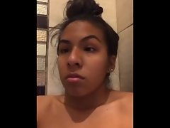 Petite Latina taking a bath