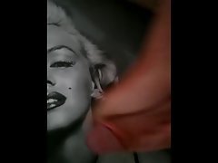 A young Russian boy jerking off and cums on Marilyn Monroe's face.