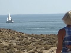 Gangbang with fucking on the beach. Blonde and 4 guys.