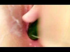 Randy teen screws her sensual cunt with cucumber