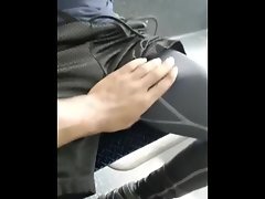 Black fellow stroking enormous dick in train