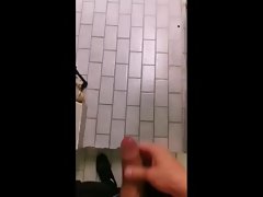 Cuming on the floor in public washroom