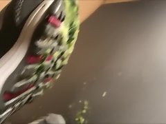 She pounded a cucumber with skechers sneaker