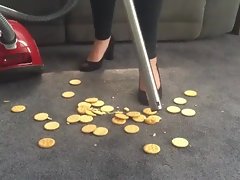 Vacuuming biscuits in high high-heeled shoes