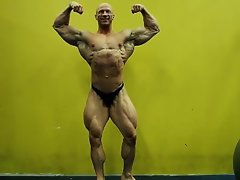 Sexual Bald Bodybuilder Flexing and Posing