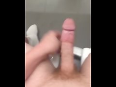 Alluring 18 y/o fumbles out a phat load in public bathroom. Gigantic cumshot.